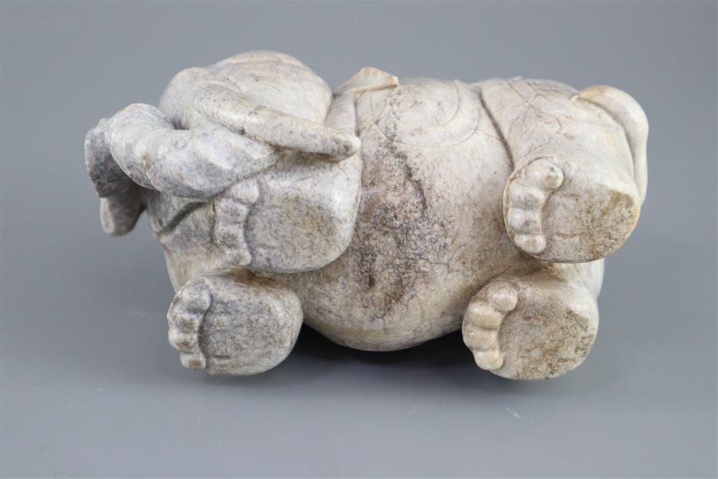 A Chinese burnt jade figure of an elephant, 15.5cm long